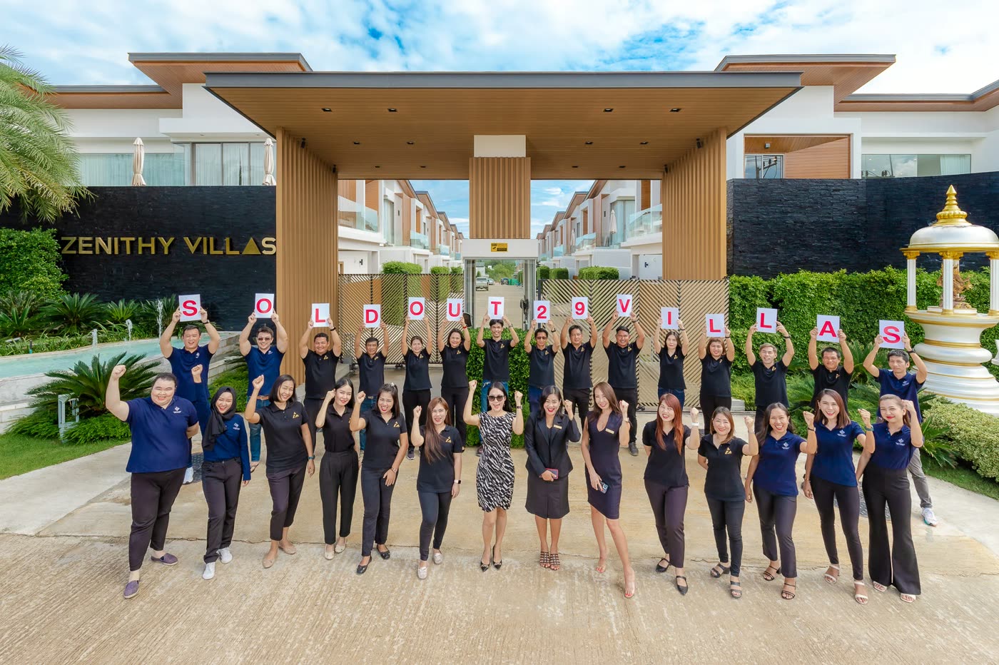 The Zenithy Development team at the Zenithy Villas entrance